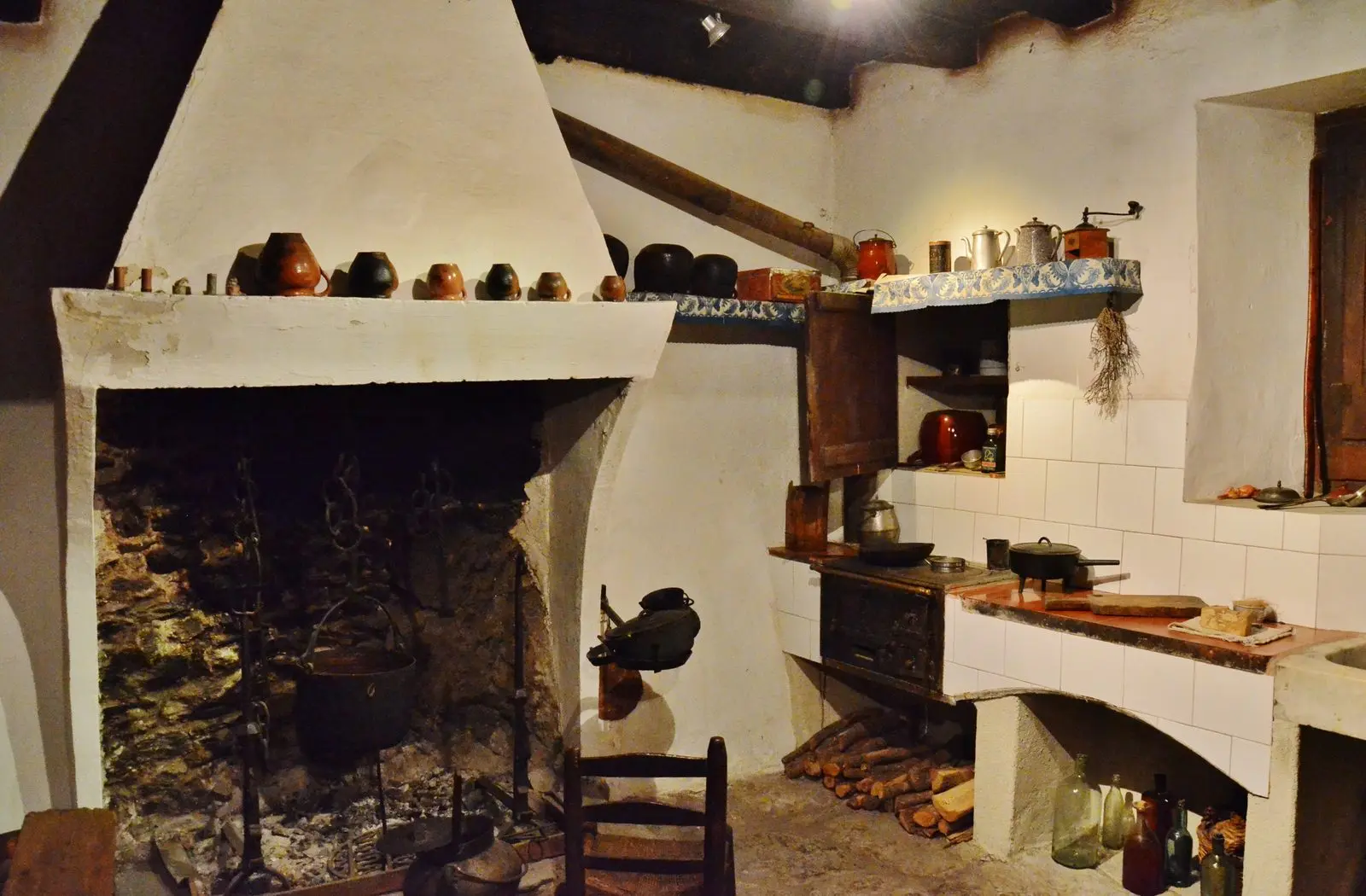 Kitchen with fireplace at Casa Rull